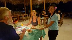 Dive into Lembeh at Hairball Resort - restaurant at night.